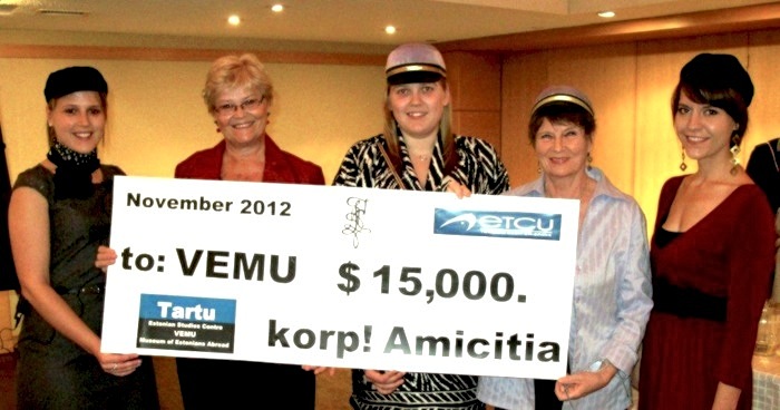 A giant-sized cheque for $15,000 from korp! Amicitia to Tartu College in support of VEMU: from the left reb! (pledge) Sonja Kauküla-Smith who conducted the wine-tasting on November 22nd; Kaja Telemt, vice-president of Tartu College's Board of Directors, Linda Veltmann, Amicitia's rebasvanem (mentor for the pledges), fund-raiser Ellen Leivat and reb! Ashley Lennox. Photo by Maaja Matsoo