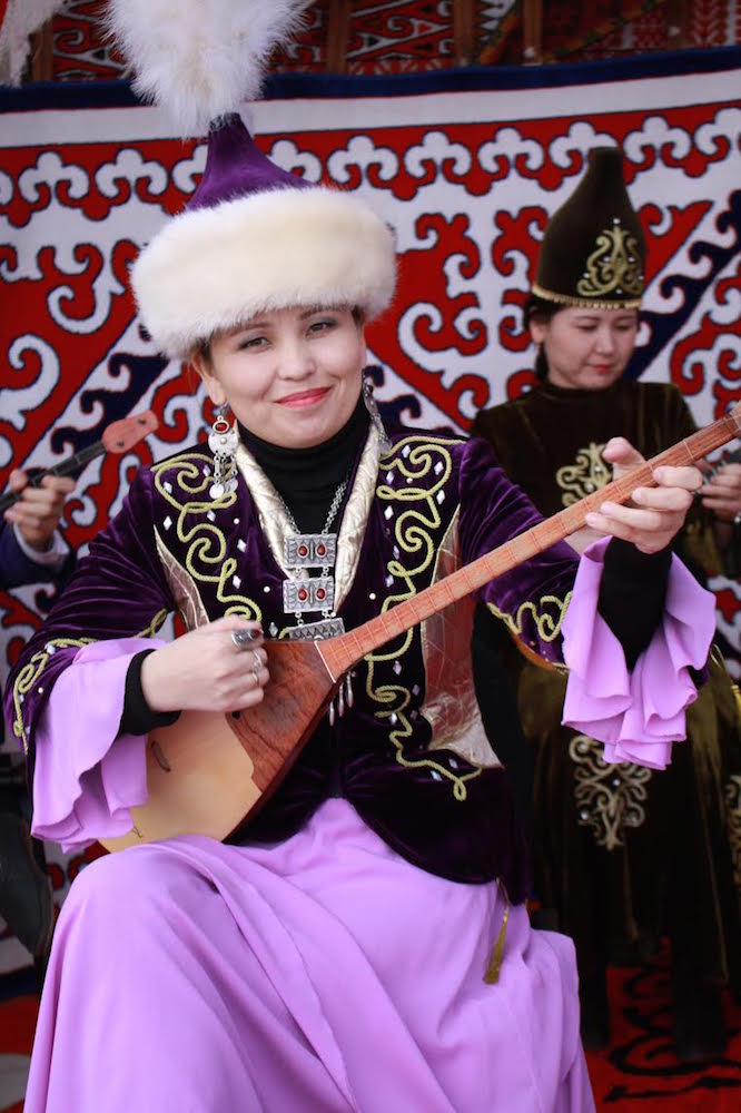 Kazakh national musical instrument dombra sounds magical at  Astana's ethno-village 'Zeiruik" - Photograph © 2015 Ülle Baum