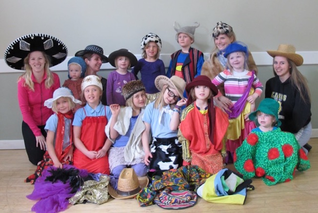 One good deed deserves another or as they say in Estonian “käsi peseb kätt”. AKEN helps support the Kungla Folk Dancers from its proceeds from the Giant Rummage and Bake Sale and the Kungla kids and instructors help to promote the sale by posing for a picture advertising the sale. Front (L to R): Eila, Eliise, Imbi, Silje, Andrea, Julia; back (L-R): Kristina, Agnes, Karin, Vera, Tuuli, Karu, Viive, Hillevi, Kariina.