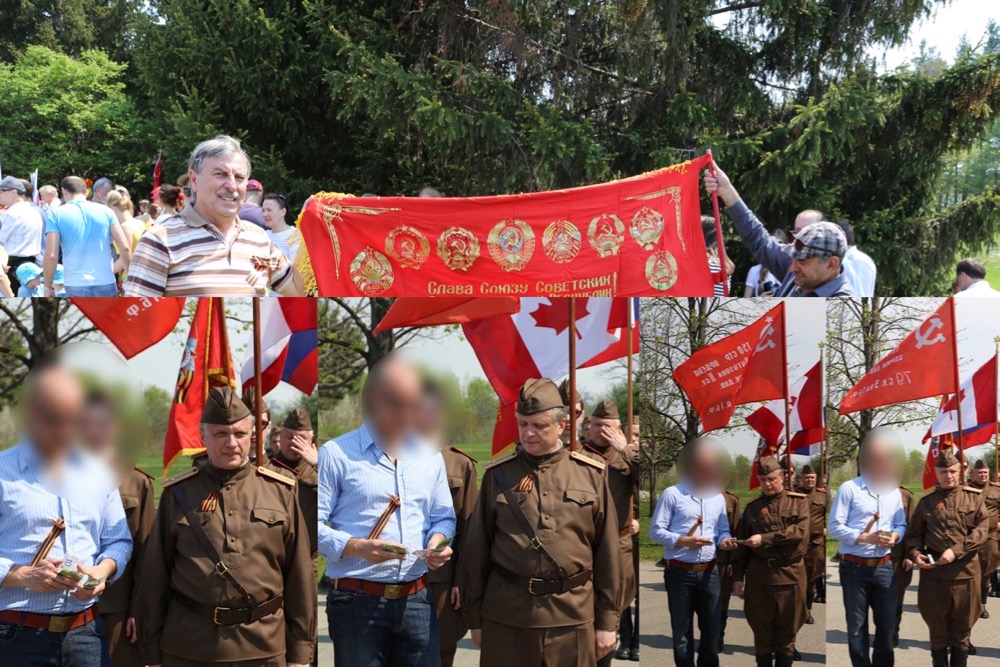 Participants, wearing the orange and black neo-fascist St. Georges ribbon hold up a banner celebrating the repression of states occupied by the Soviet Union.