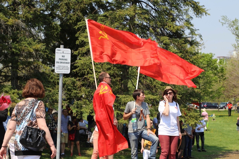 Participants wrap themselves in symbols of tyranny and repressive occupation.