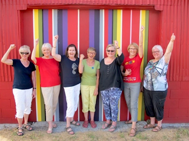 Members of the Estonian Ethnographic Society in Canada, from left Rutt Veskimets, Mall Puhm, Helle Arro, Ellen Leivat, Kati Marley, Maaja Matsoo and Liis Teedla, are proud as punch of their colourful, striped contribution to the blocks of the Prince Edward County Barn Quilt Trails. Photo: Maaja Matsoo