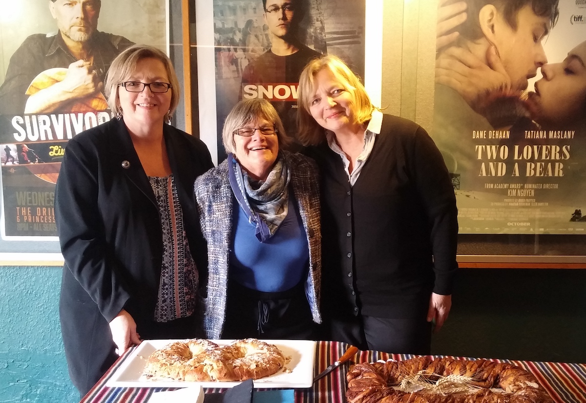 From left: Rutti Yalle, Lia Sarafian and Krista Heap offering Estonian "kringel" to the public after the screening of "The Singing Revolution" inWaterloo, Ont., 23, Oct 2016- Photo by Martin Kiik (2016)