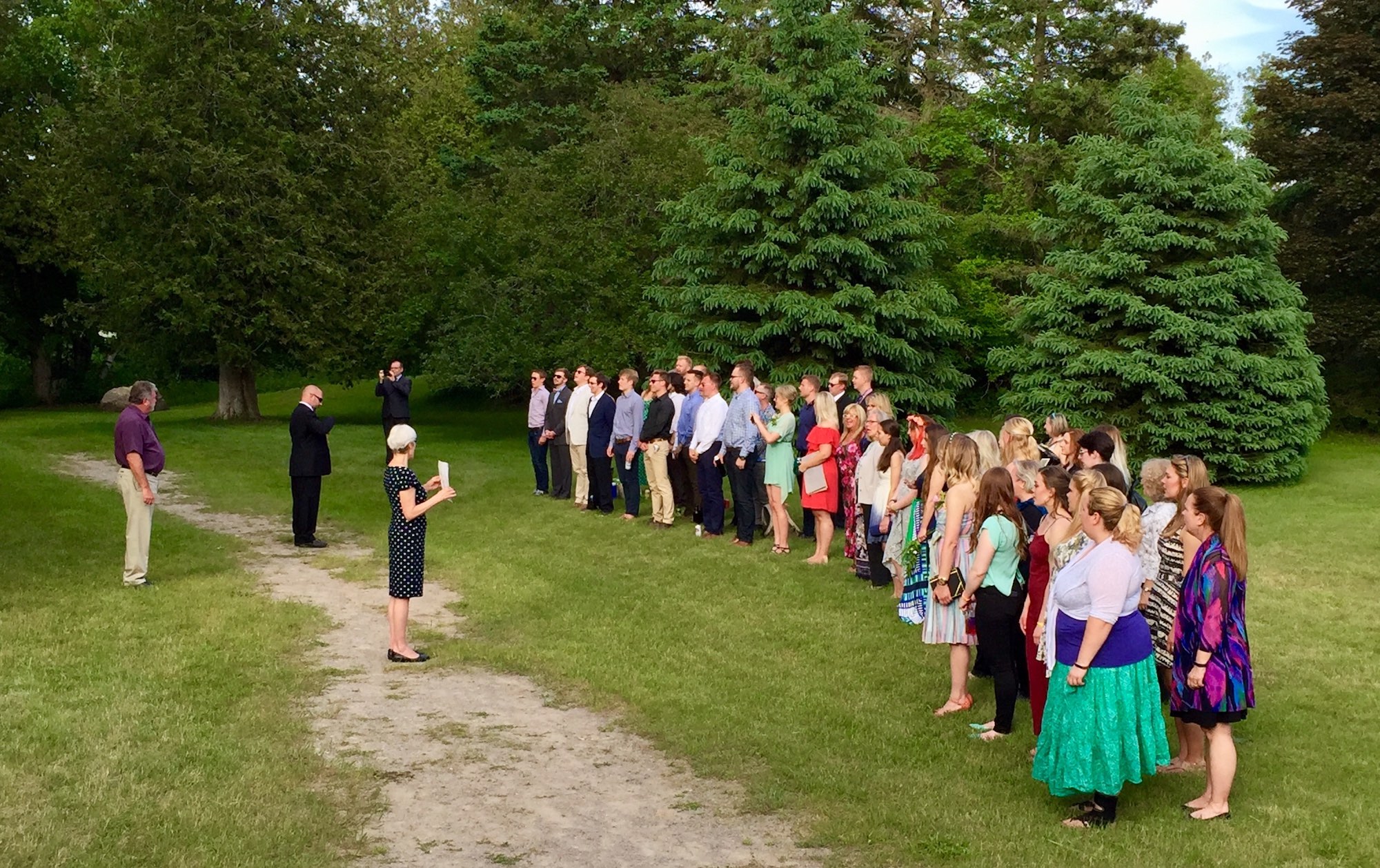 As the JKAL camp flag is lowered and the sun sets on Saturday, campers are washed up and dressed up in anticipation of the formal banquet that awaits.  Thanks to chefs Kristina Kald and Paul Lillakas, everyone enjoyed a gourmet dinner somewhat more upscale than what we remember from our days at Suvekodu.  Photo credit:  Kristina Põldre (2018)