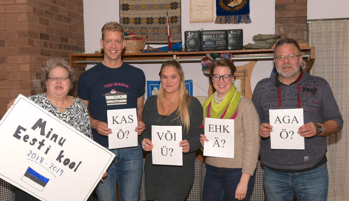 Teacher Epp Aruja, left, and students