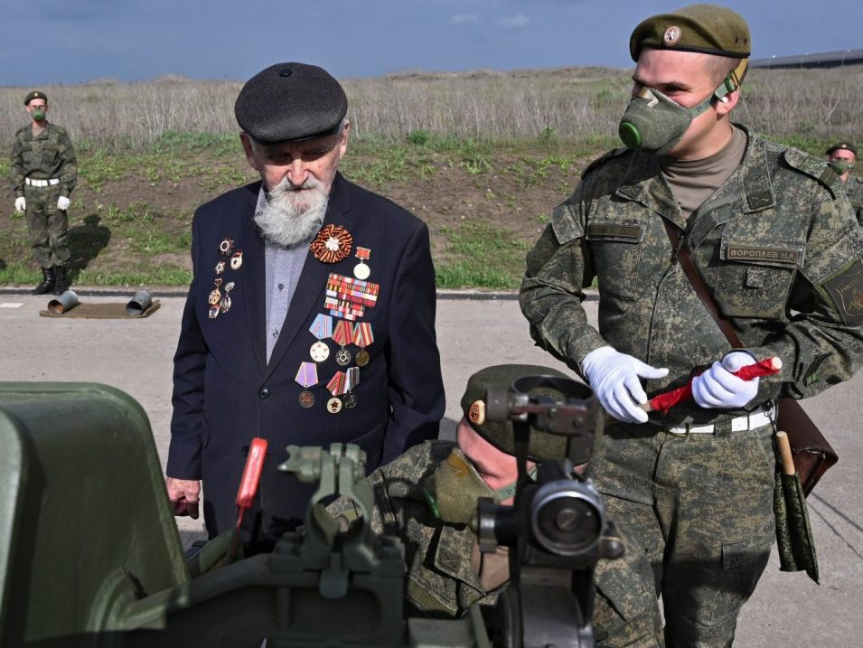 Second World War veteran Ivan Chubov, 94, examines an artillery piece as he attends exercises of artillery crews ahead of the Victory Day celebrations, amid the COVID-19 outbreak, at a range in Rostov Region, Russia, Thursday, May 7, 2020.Sergey Pivovarov / Reuters