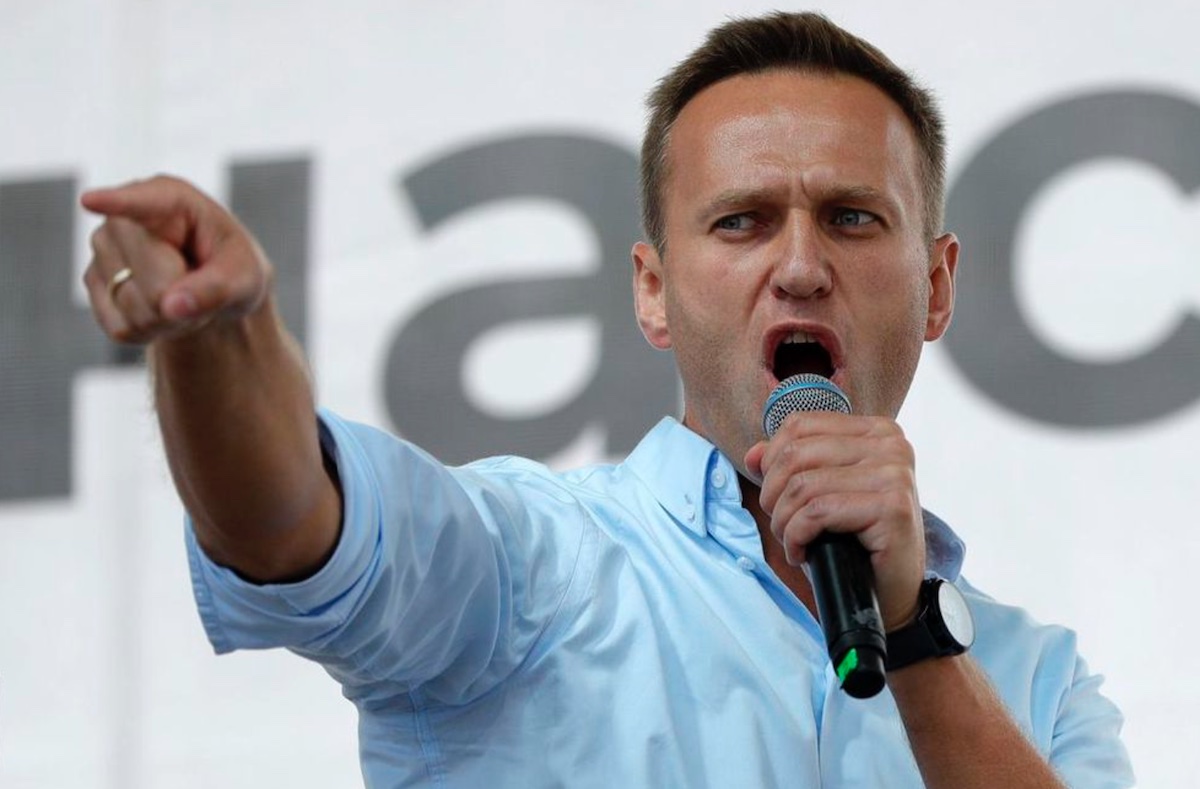 In this July 20, 2019, file photo, Russian opposition activist Alexei Navalny gestures while speaking to a crowd during a political protest in Moscow. Berlin’s Justice Ministry has approved a request from Moscow for legal assistance in the investigation of the poisoning of Navalny, and has tasked state prosecutors with working with Russian authorities. PAVEL GOLOVKIN / AP