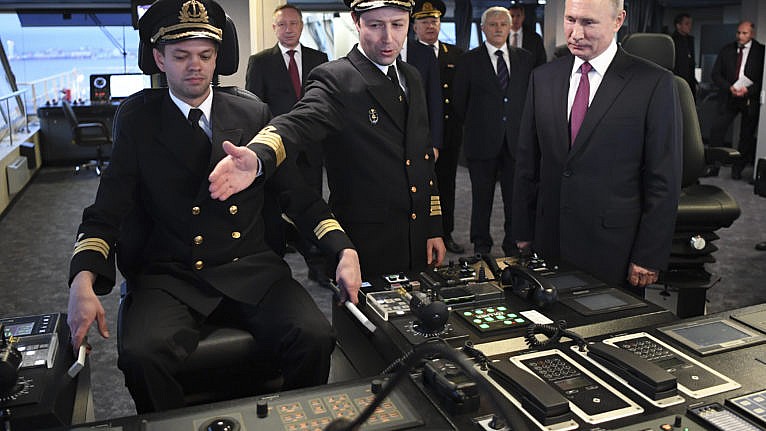 Putin, right, visiting the bridge of the newly built icebreaker Viktor Chernomyrdin in St. Petersburg, Russia, in November. Russia is rapidly expanding its fleet of icebreakers as it expands its reach in the Arctic. (Alexei Nikolsky, Sputnik, Kremlin Pool Photo via AP)