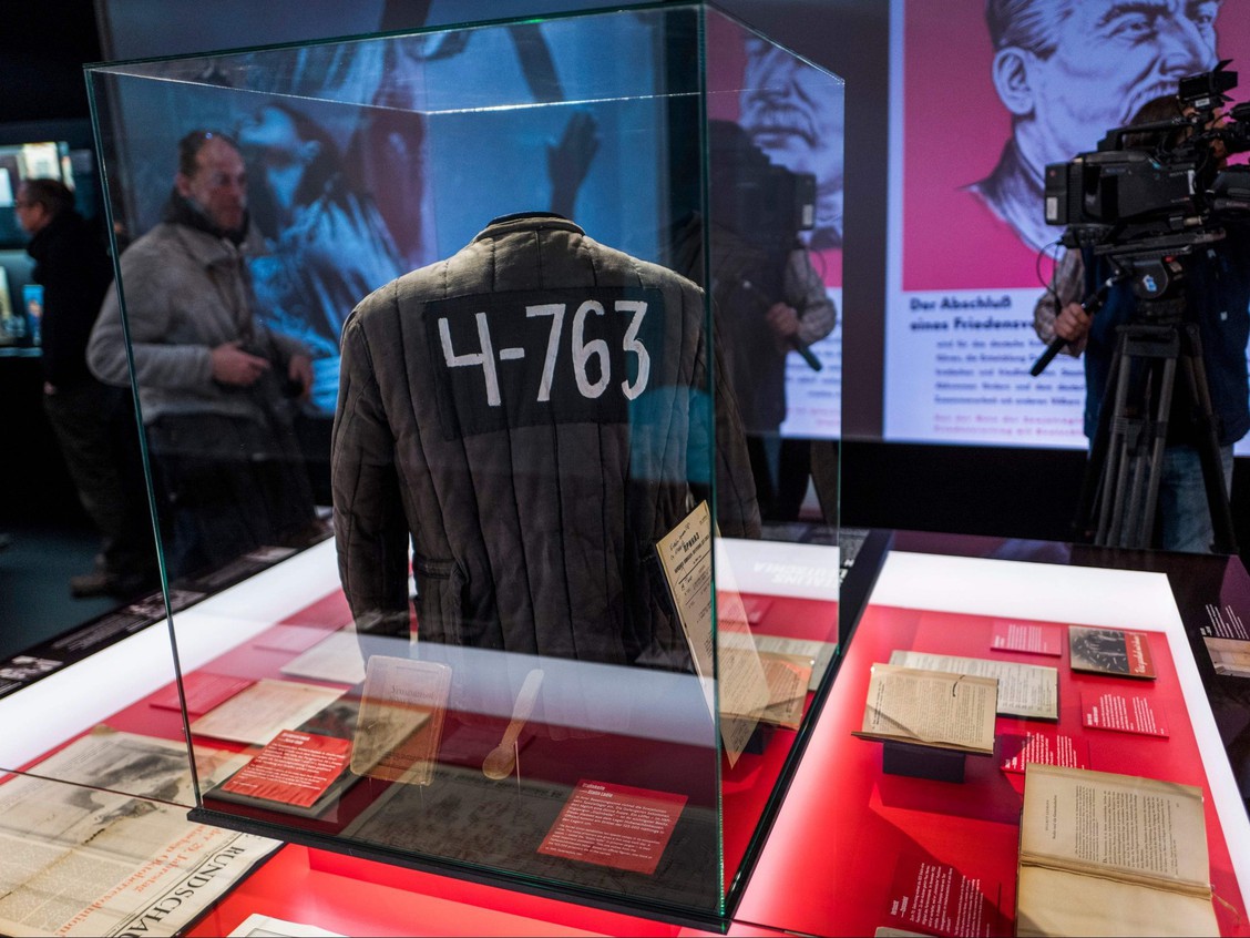 In this Jan. 23, 2018 file photo, a padded jacket, traditionally worn by prisoners in the Soviet Gulag labour camp system, is on display next to a wooden spoon dubbed as "Stalin ladle" at the "Stalin - The Red God" exhibition at the Berlin-Hohenschoenhausen memorial. PHOTO BY JOHN MACDOUGALL /AFP via Getty Images / torontosun.com