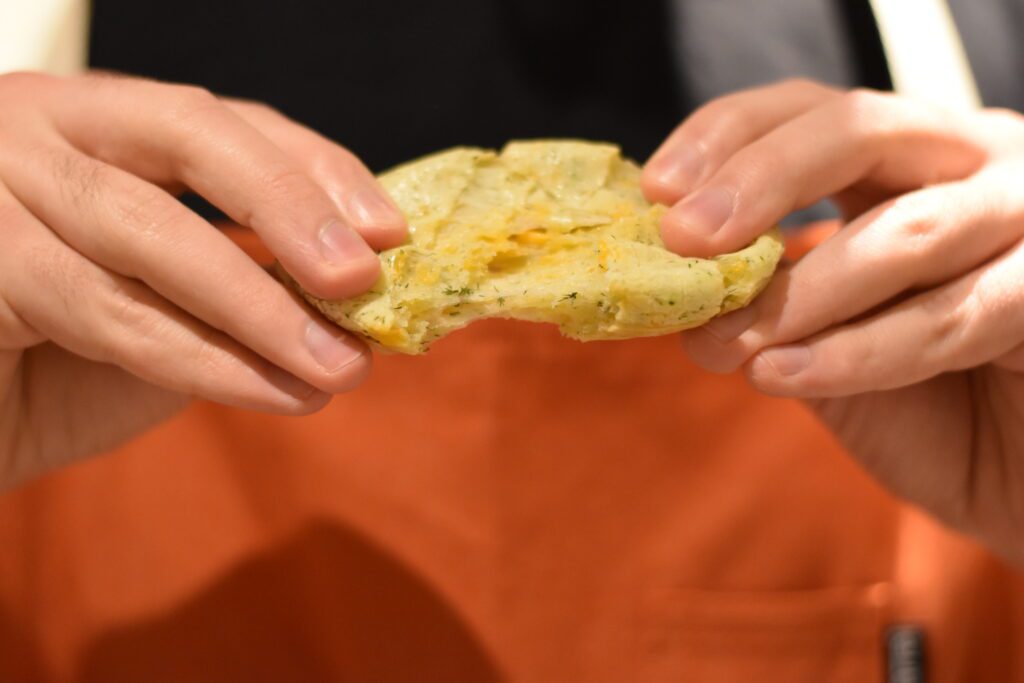 Pulling apart one of the cheese buns