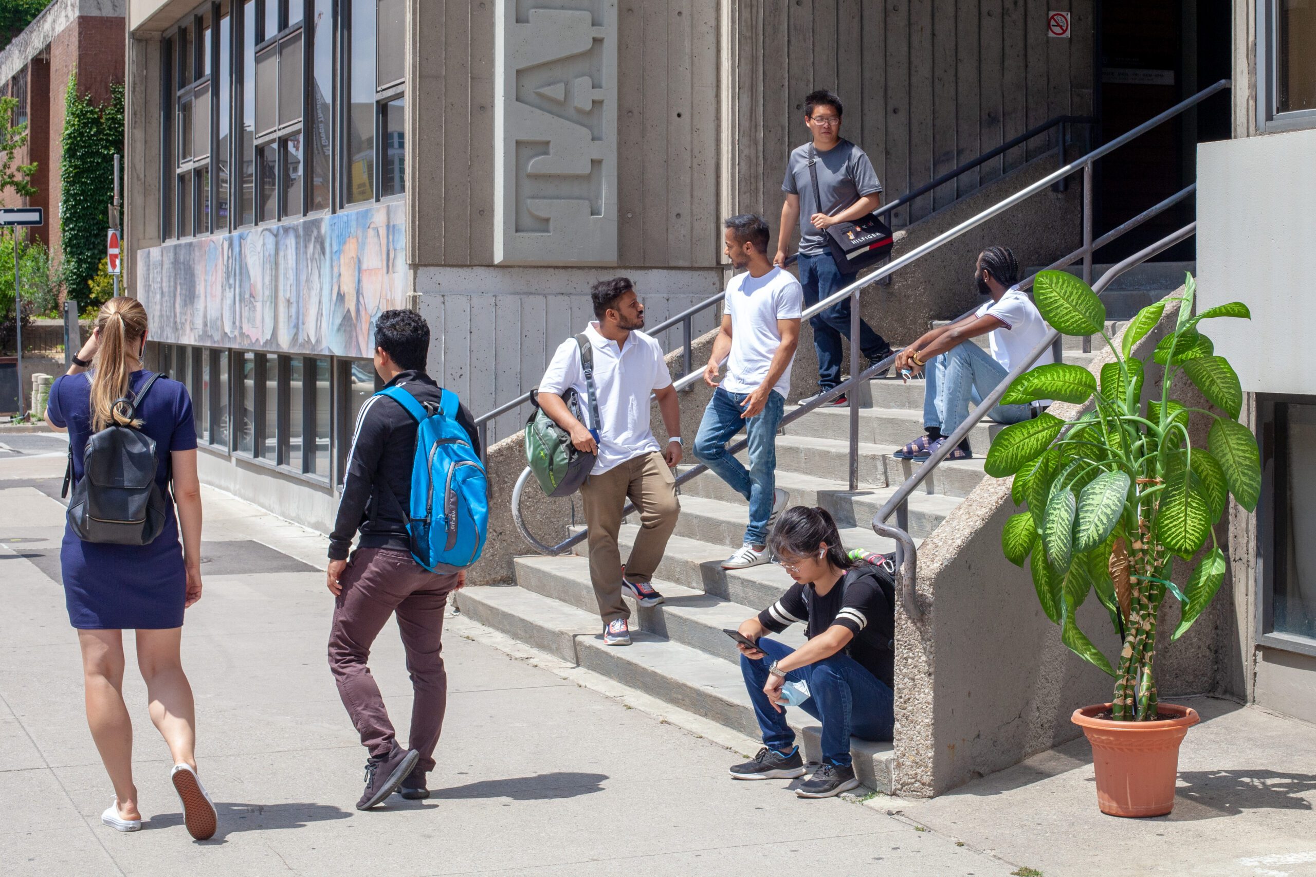 Students in front of Tartu College Student Residence in Toronto, Canada