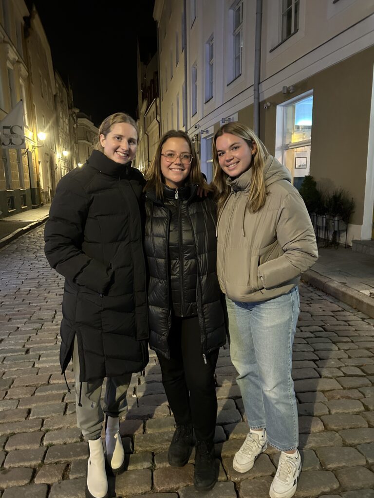 From left, Aleksa Gold, Helle Wichman, and Keili Moore on Pikk St in the Old Town of Tallinn (photo by Hillar Lauri)