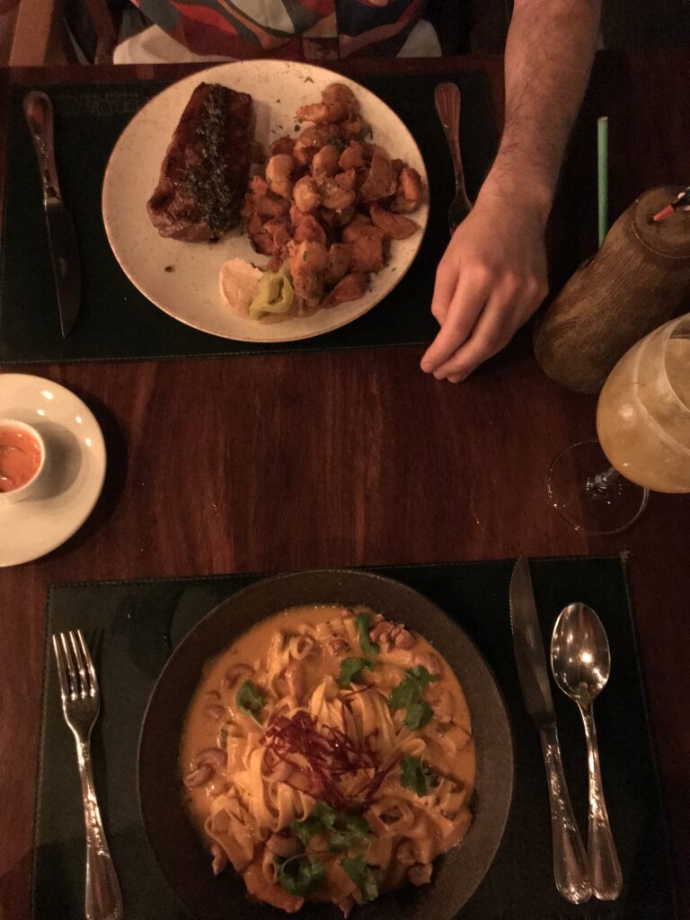 Bisteca (steak) and moqueca (seafood stew) at Selvagem restaurant in São Paulo