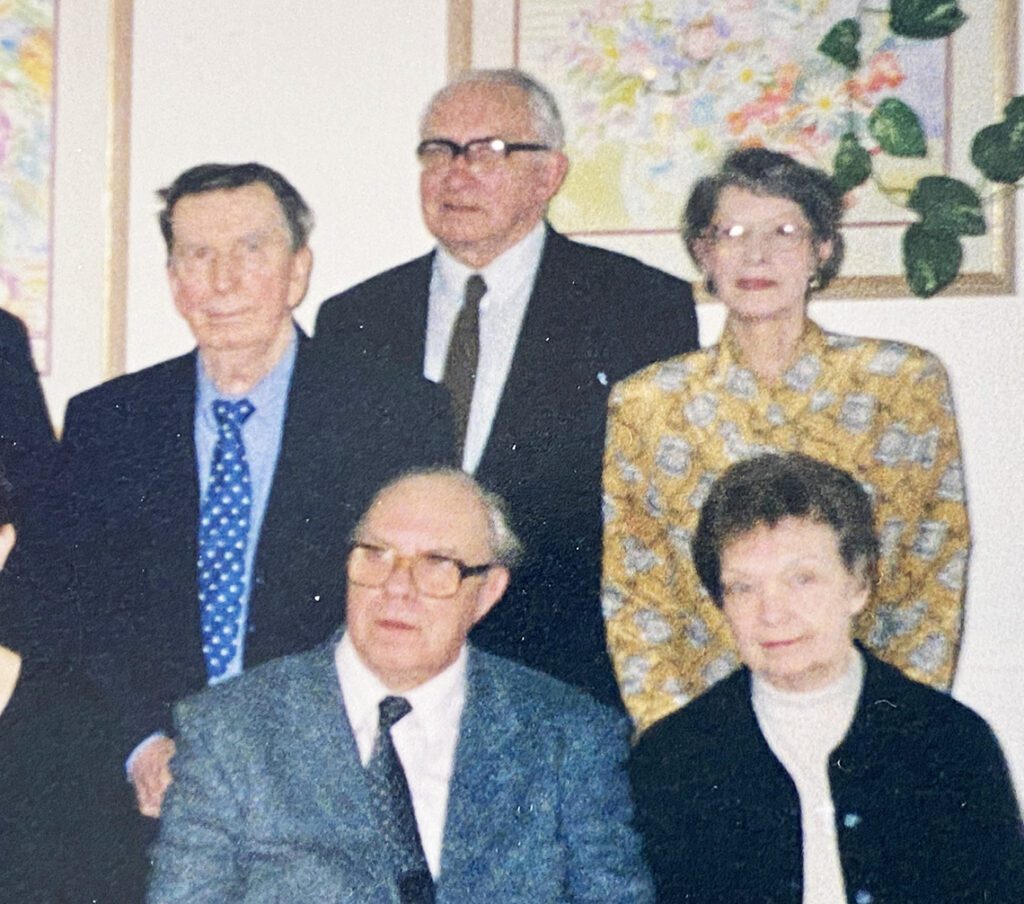 Lucy Hanssoo, nee Päts, standing, right. Lucy’s husband Aadu Hanssoo (1928-1999), seated, left