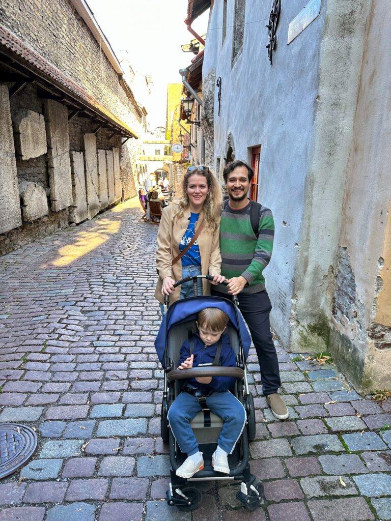 Marili, her husband, and their son in Tallinn's Old Town in July 2023