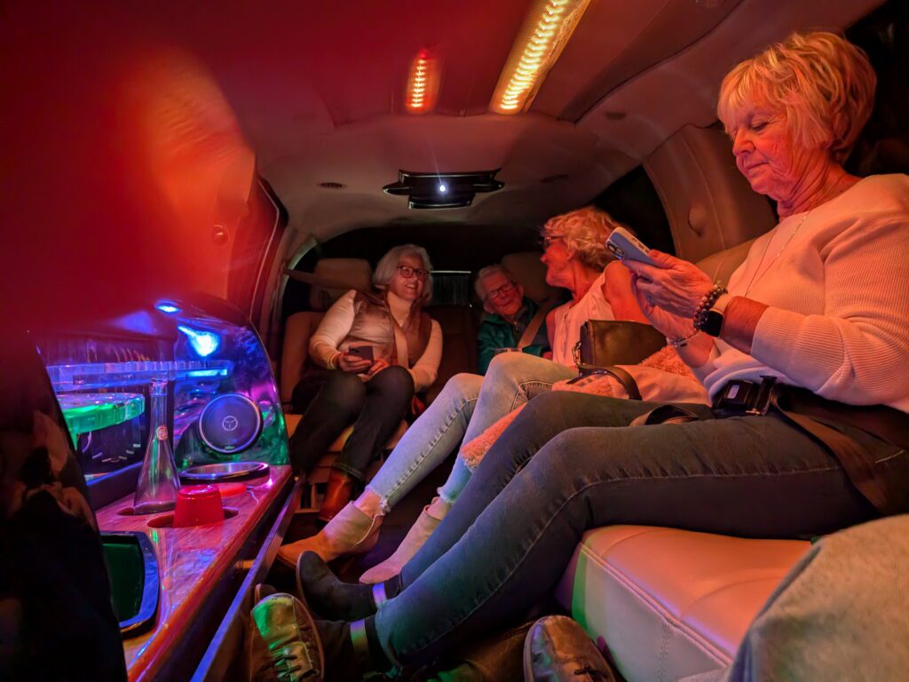 Katrin's mother Ingeborg (second from left) sitting in the back of the limousine with Katrin's sister, Ingrid (third from left), on the way to the concert