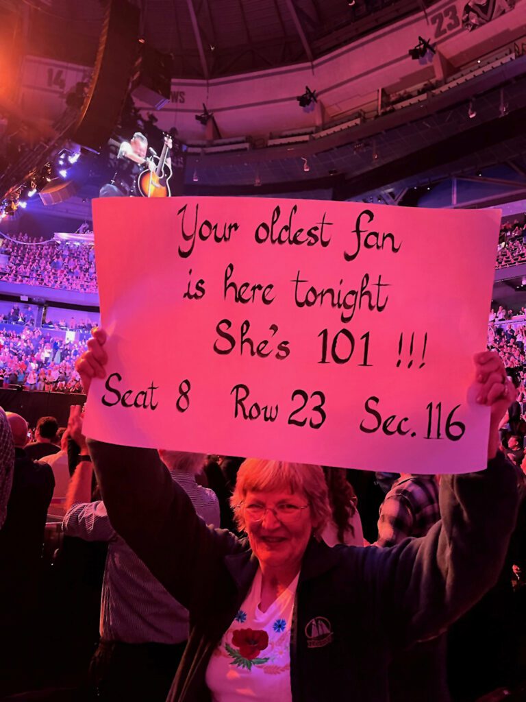 Katrin holding the sign