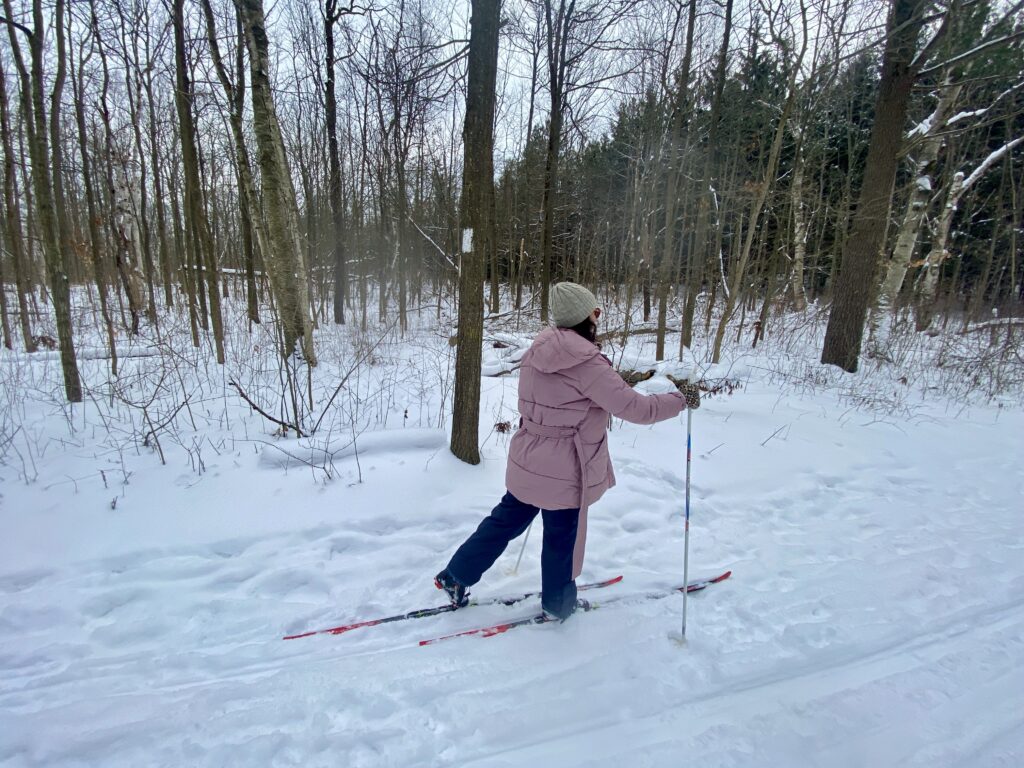 An example of gliding on classic skis—once you get moving, you won't need that jacket anymore!