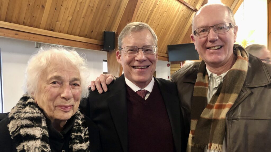 Laine (Tim's mother-in-law), Tim, and Tõnu Naelapea at a Vana Andres congregation service