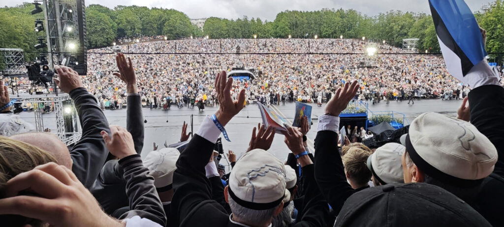 Despite the rain, the Song Festival grounds were full of people. Photo: Paul Kiilaspea
