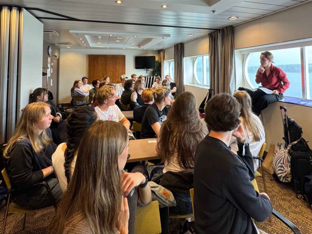 13 ESTO youth delegates writing about and discussing their reflections on the ESTO schedule