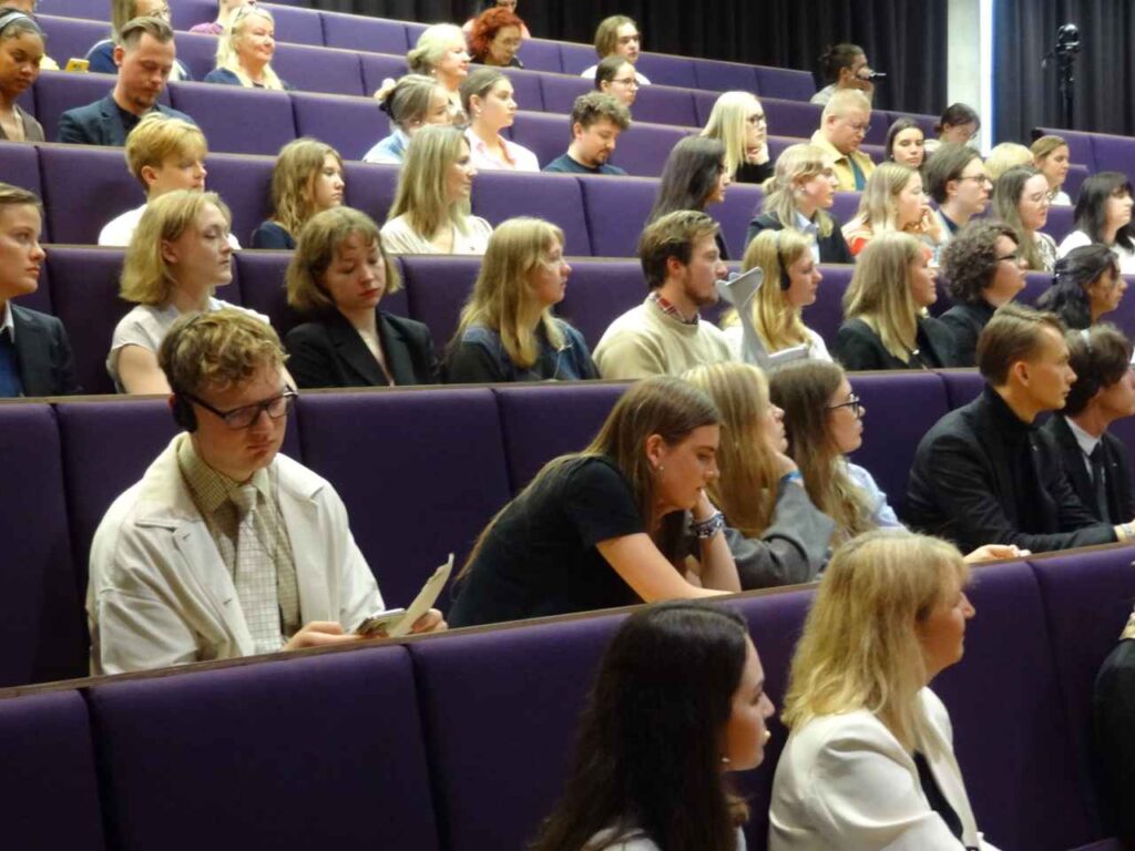 ESTO youth delegates taking notes