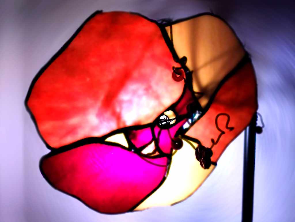 A close-up of Maire Valdma’s poppy-shaped stained-glass lamp in Lummus (photo: Jerry Mercury)