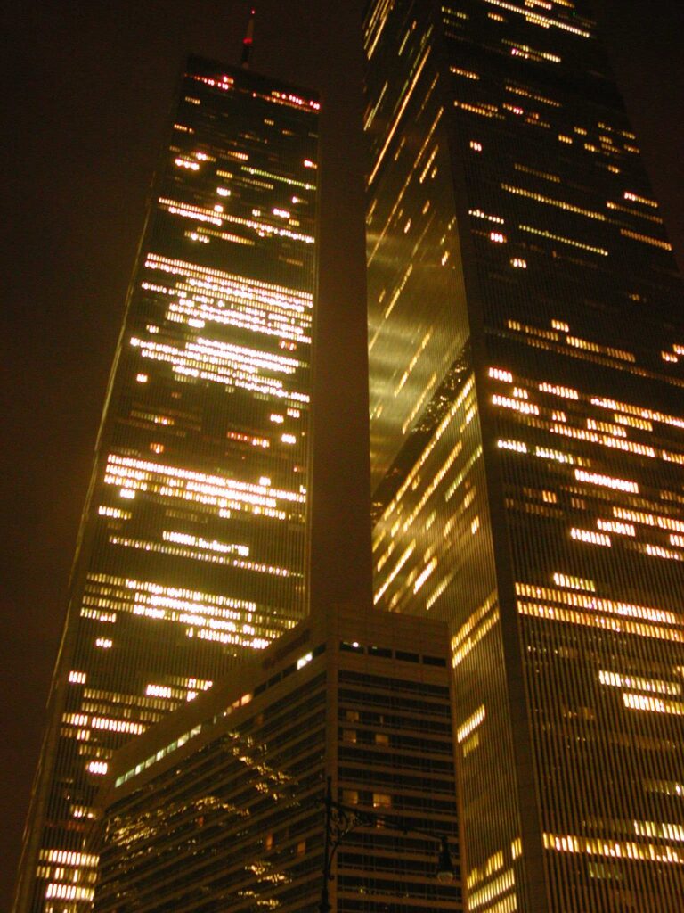 Looking at his workplace in August 2000
