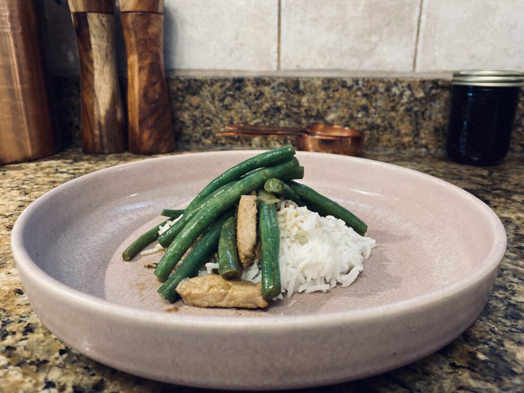 Assemble the pork and veg over a bed of rice and don't forget to pour on some of the juices from the pan