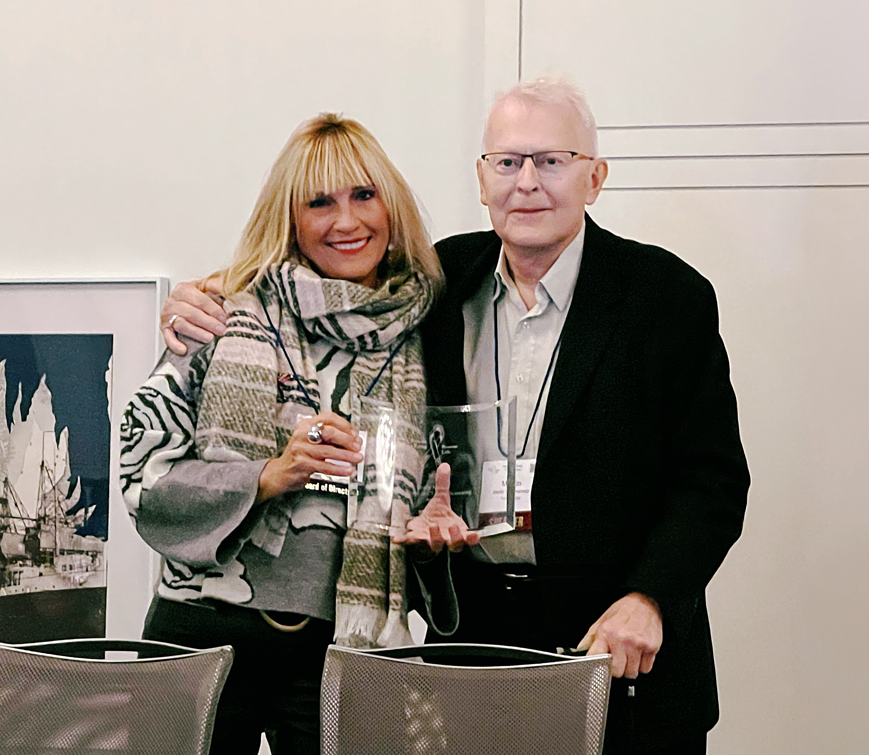 Dr. Andrea McKee presenting Dr. Tammemägi the award on Saturday October 25th, 2025