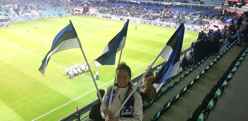 Kaili and Kaarin’s relative Kati showing her Estonian pride at a soccer game – one of those gatherings where Estonians come together with an easy sense of community.