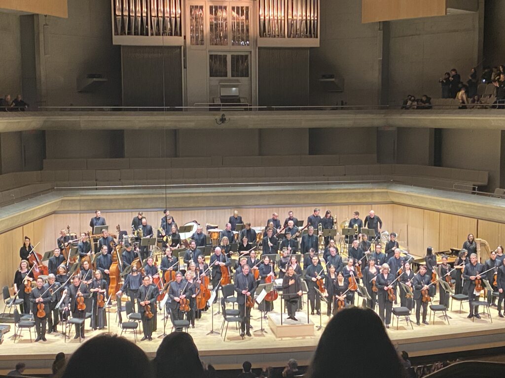 Eva Ollikainen and the TSO at the conclusion of the concert