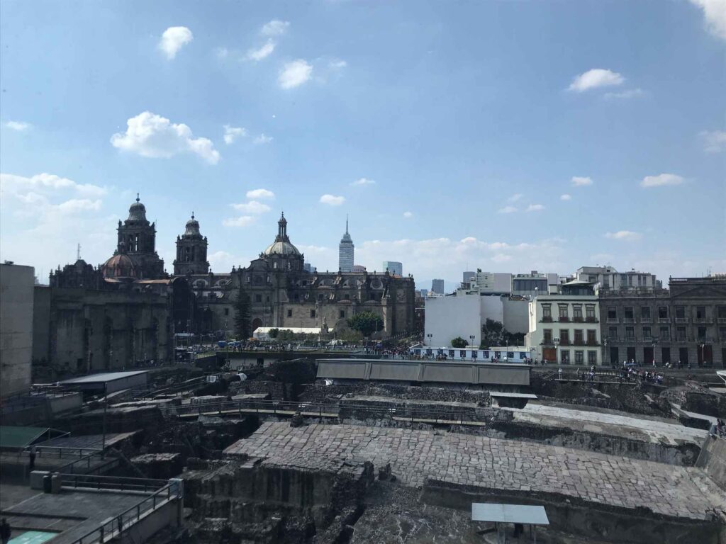The Templo Mayor ruins, Metropolitan Cathedral, and Torre Latinoamericana all in one view
