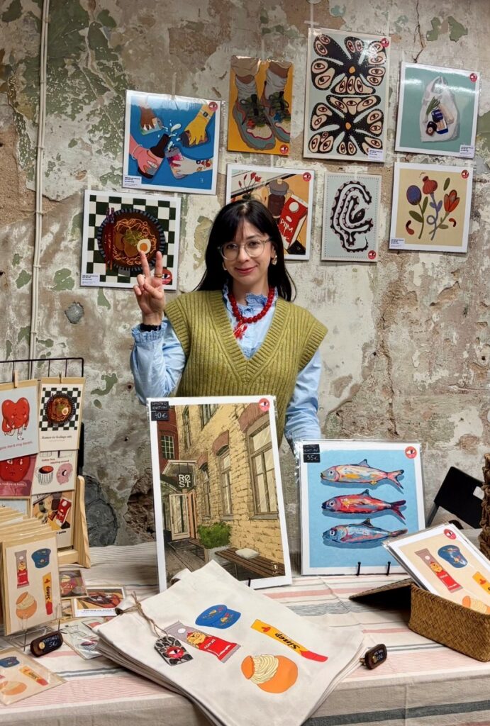 Ksenia Yolk with a selection of her artwork and prints (photo courtesy of the artist)